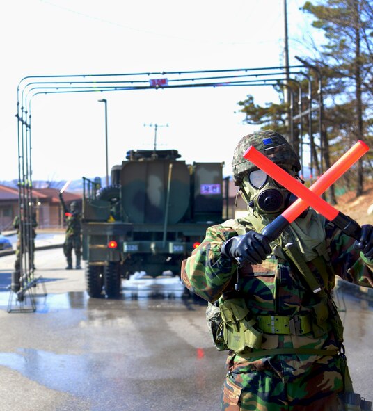 Republic of Korea Airmen exhibit mobile Chemical, Biological, Radiological, Nuclear and Explosive, CBRNE; DECON capabilities during a simulated biological event exercise at Osan Air Base, ROK, March 12, 2015. Airmen from the 51st Civil Engineer Squadron gathered with Republic of Korea Airmen for a mutual demonstration and exchange of CBRNE collection and decontaminations procedures. 
(USAF photo by Staff Sgt. Amber Grimm)