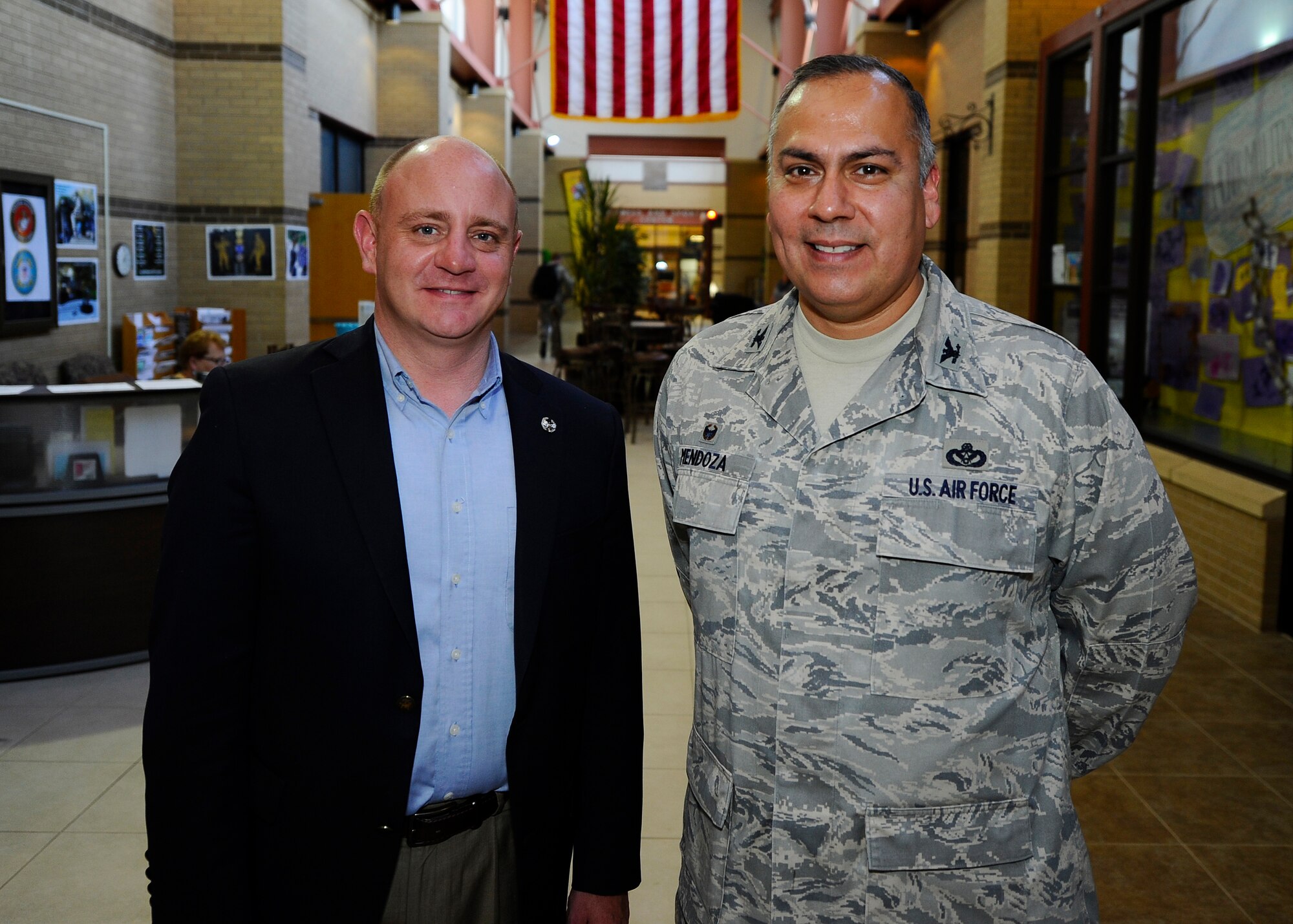 James Havers-Strong, ABI Group of Companies CEO and managing director and 931st ARG honorary commander, and Col. Michael Mendoza, 22nd Mission Support Group commander, pose for a photo during an Honorary Commander Mission Support Group Base Tour at McConnell Air Force Base, Kan., April 7, 2015.  Honorary commanders are local community partners who are paired with base commanders for a year or more. They spend their tenure learning about the base’s mission, assets and program. (U.S. Air Force photo by Senior Airman Victor Caputo)