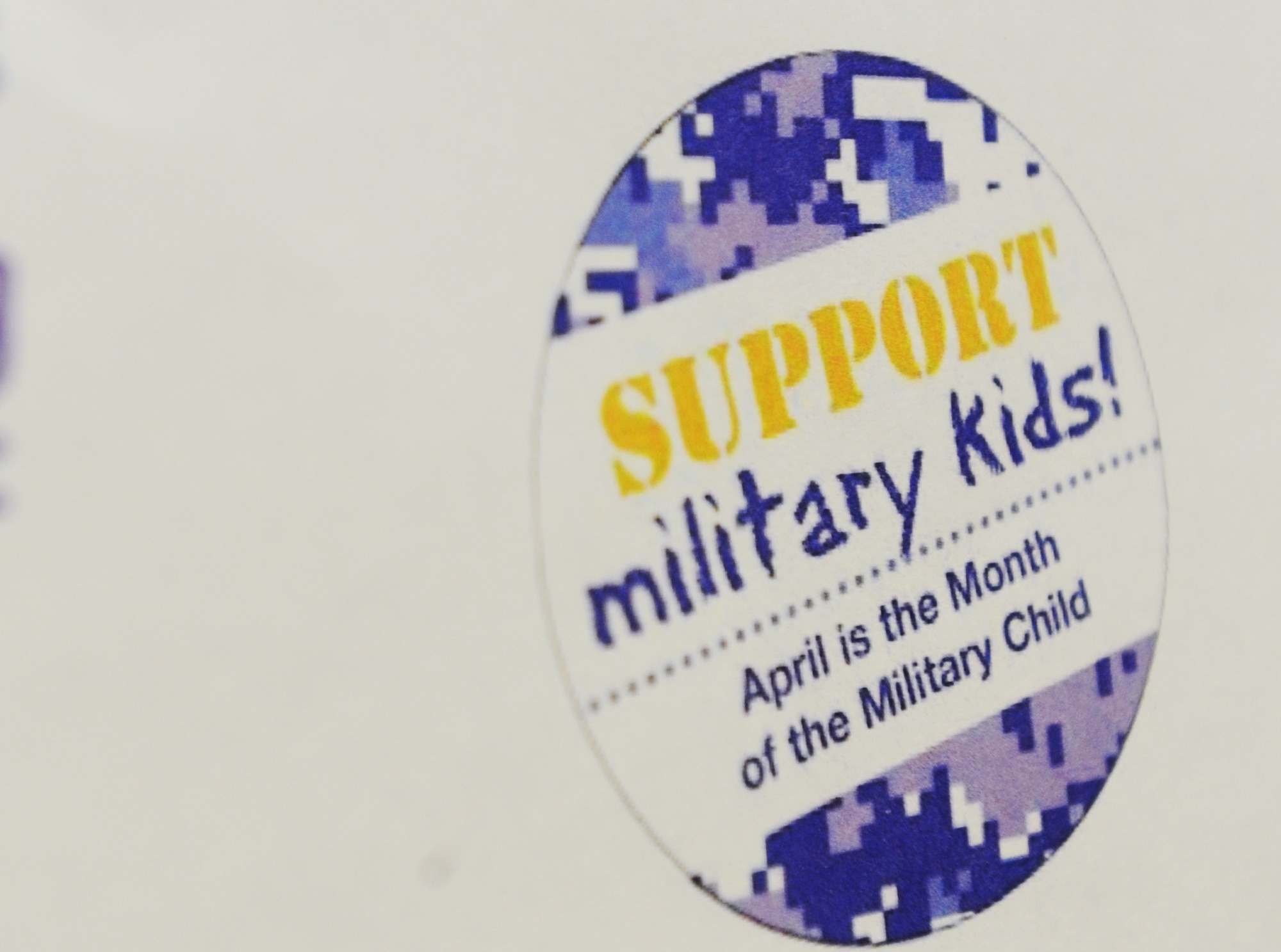 Awareness posters hang on the doors of Child Development Center II at Joint Base Andrews, Md., throughout the month of April to inform service members and their families about Month of the Military Child. The MoMC, established in 1986 by former Secretary of Defense Casper Wienberg, aims to honor the sacrifice and service of more than 1.9 million U.S. military children around the world.  (U.S. Air Force photo/ Staff Sgt. Nichelle Anderson)