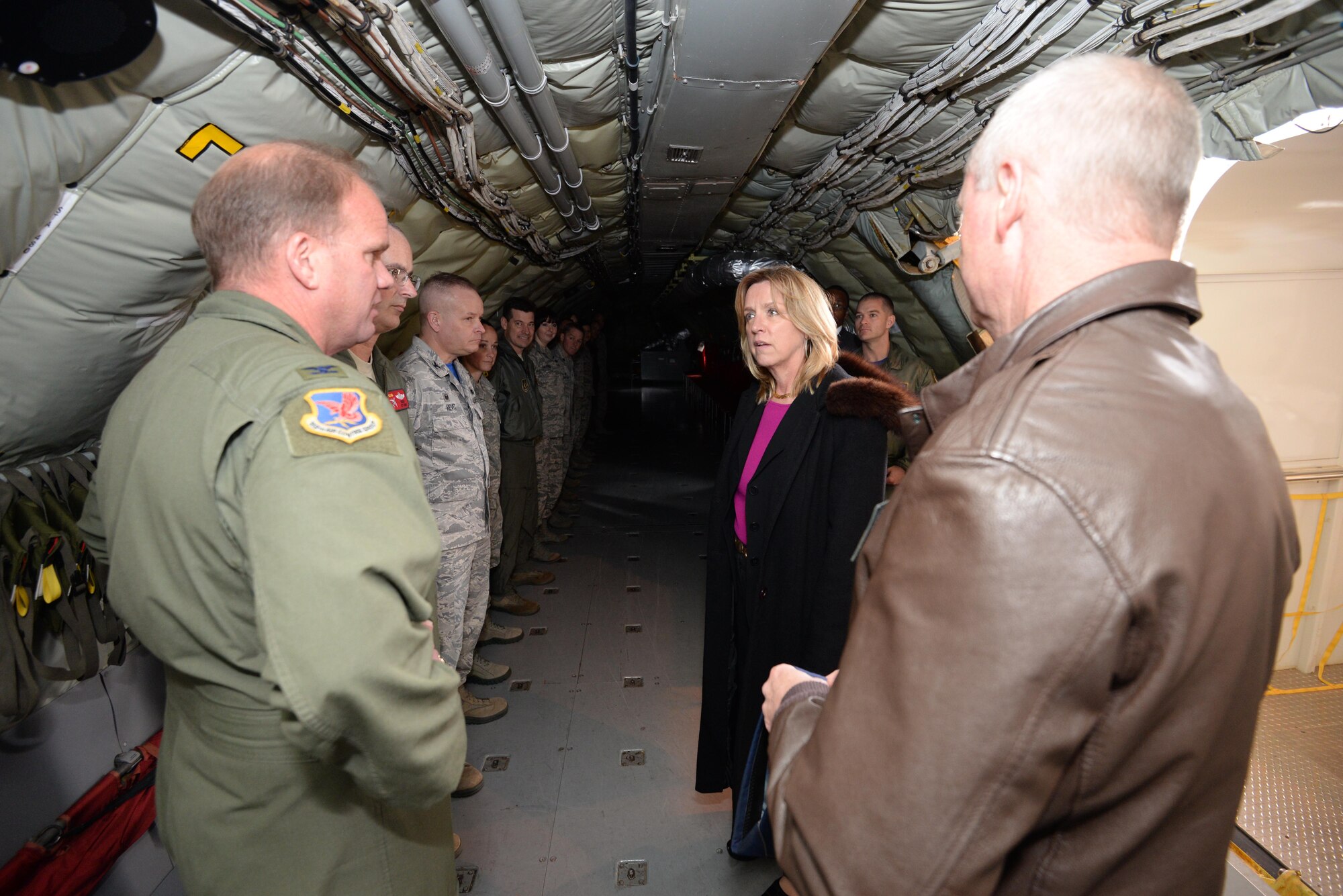 Col. David Robertson, 513th Air Control Group commander and Col. Brian Davis, 507th Air Refueling Wing commander speak with the Secretary of the Air Force Deborah Lee James about Reserve operations  during the secretary’s visit here March 27. (U.S. Air Force Photo/Staff Sgt. Caleb Wanzer/Released) 


