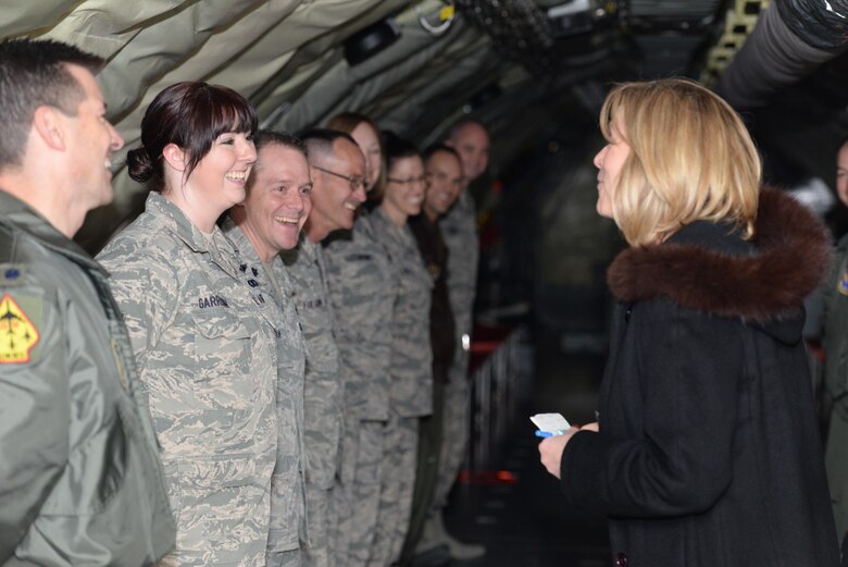 Senior Airman Rachael Garrison, 465th Air Refueling Squadron, briefs Secretary of the Air Force Deborah Lee James about operational deployments in the Reserve component during the secretary’s visit to the 507th Air Refueling Wing here March 27. (U.S. Air Force Photo/Staff Sgt. Caleb Wanzer) 

