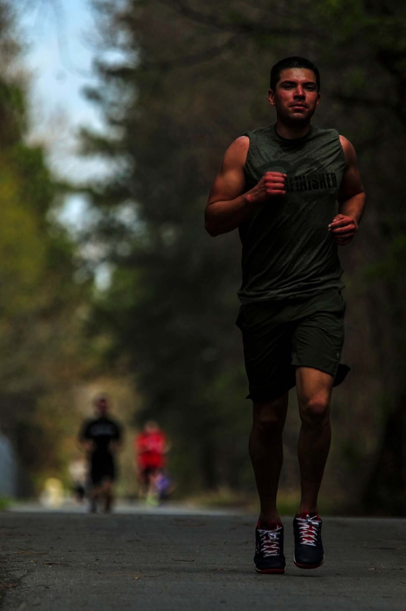 Staff Sgt. William Silva, 4th Civil Engineer Squadron pavement and equipment technician, participates in a 5K Fun Run, April 3, 2015, at Seymour Johnson Air Force Base, North Carolina. Silva finished the race in third place with a time of 23 minutes, 8 seconds. (U.S. Air Force photo/Senior Airman Brittain Crolley)