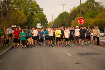 Participants of the Joint Base Charleston Sexual Assault Awareness Month 5K Walk/Run line up at the starting line April 4, 2015, JB Charleston, S.C. The month of April has been declared the official SAAM for JB Charleston with a theme of “Eliminate sexual assault: Know your part. Do your part.” Events will be held throughout the month to help promote awareness. (U.S. Air Force photo / Airman 1st  Class Taylor Queen)