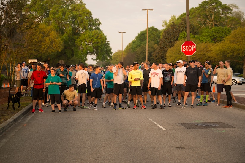 Participants of the Joint Base Charleston Sexual Assault Awareness Month 5K Walk/Run line up at the starting line April 4, 2015, JB Charleston, S.C. The month of April has been declared the official SAAM for JB Charleston with a theme of “Eliminate sexual assault: Know your part. Do your part.” Events will be held throughout the month to help promote awareness. (U.S. Air Force photo / Airman 1st  Class Taylor Queen)