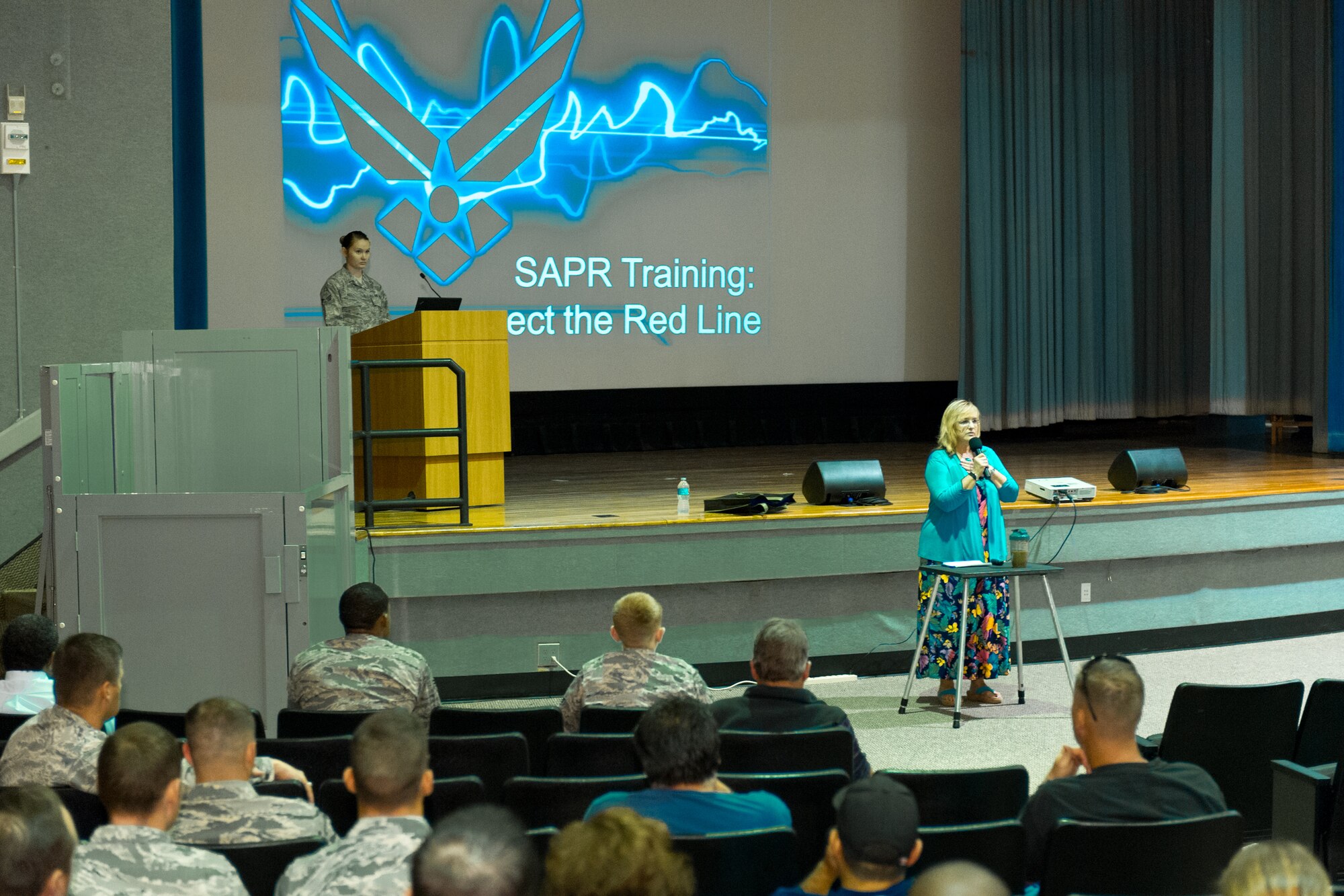 Patricia Gragg, 45th Space Wing Sexual Assault Response Coordinator, kicks off a Sexual Assault Prevention and Response training session at the Patrick Air Force Base Theater, Fla., April 7, 2015. (U.S. Air Force photo/Cory Long) (Released)