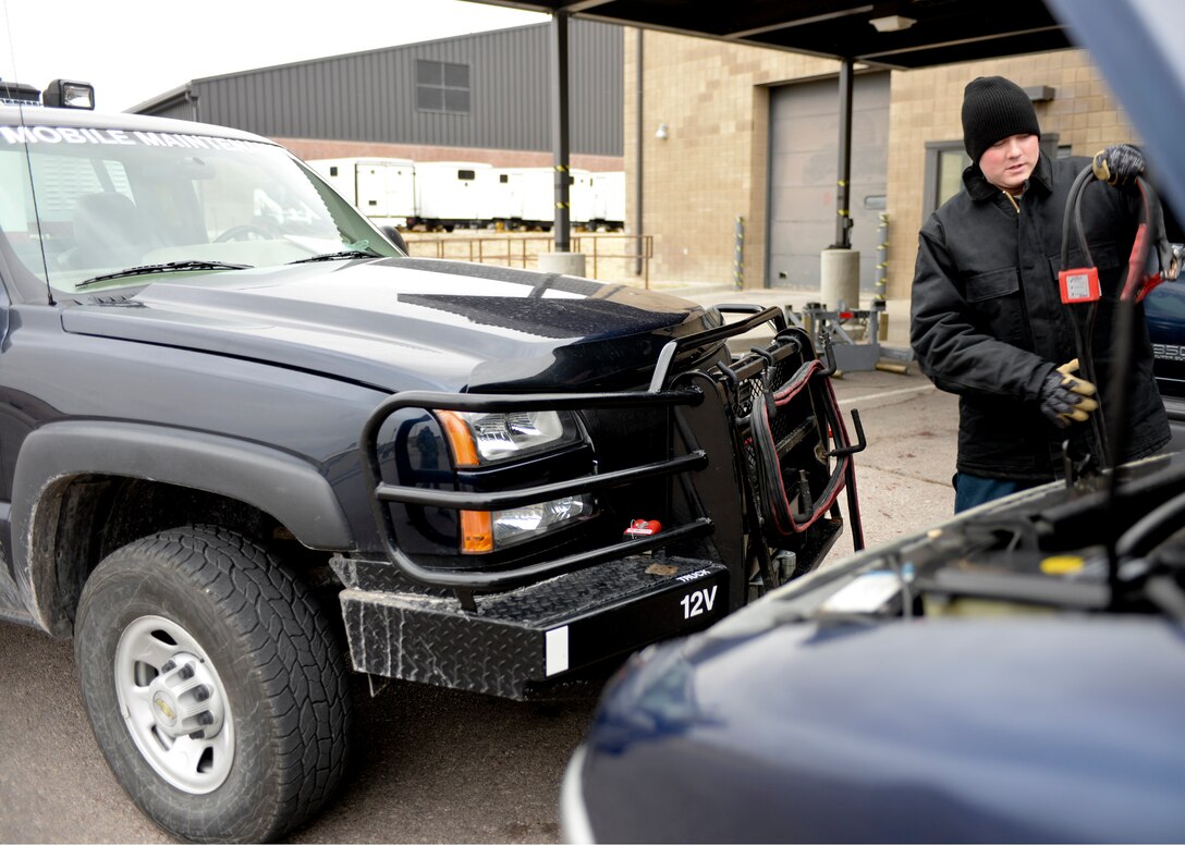Senior Airman William Evans, 28th Logistics Readiness Squadron vehicle maintenance customer service technician, responds to a vehicle service call at Ellsworth Air Force Base, S.D., March 17, 2015. Evans maintains Ellsworth’s vehicle fleet through routine inspections, troubleshooting issues and repairs. (U.S. Air Force photo by Senior Airman Anania Tekurio/Released)