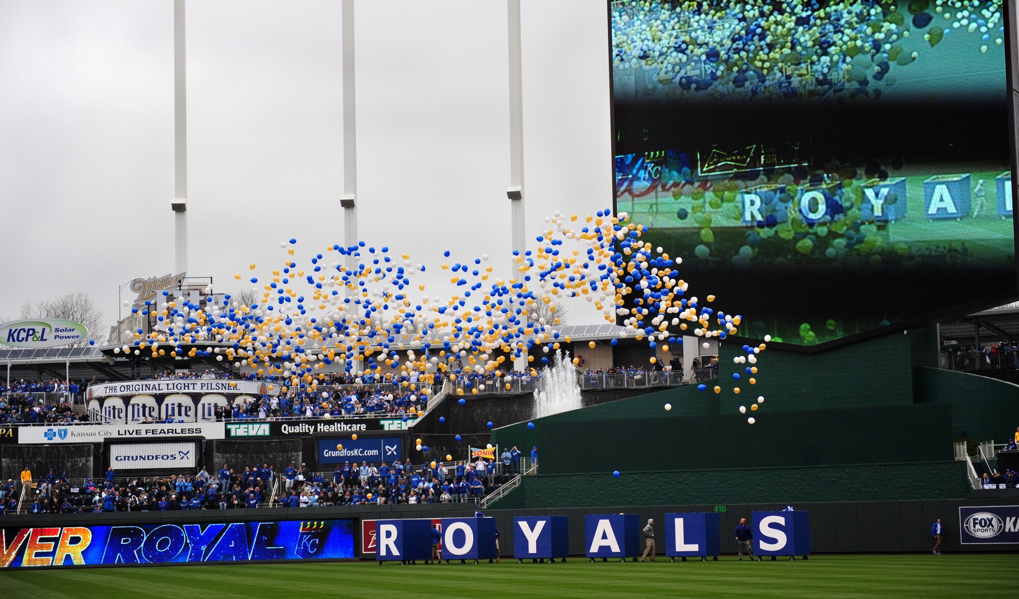 Balloons release before the beginning of the Kansas City Royals opening day game at Kauffman Stadium April 6, 2015. More than 100 Airmen from Whiteman Air Force Base, Mo. participated in a flag detail before the game. (U.S. Air Force photo by Airman 1st Class Joel Pfiester/Released)