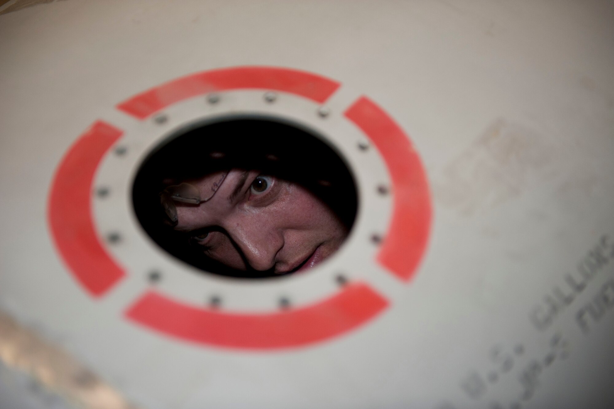 Staff Sgt. Frank Ruckel, 49th Maintenance Squadron Aircraft Metals Technology shift lead, inspects the welds on a 600-pound external fuel tank at Holloman Air Force Base, N.M. April 6, 2015. The external fuel tank is used on the F-16 Falcon to increase flight duration. (U.S. Air Force photo by Staff Sgt. E’Lysia A. Wray/Released)