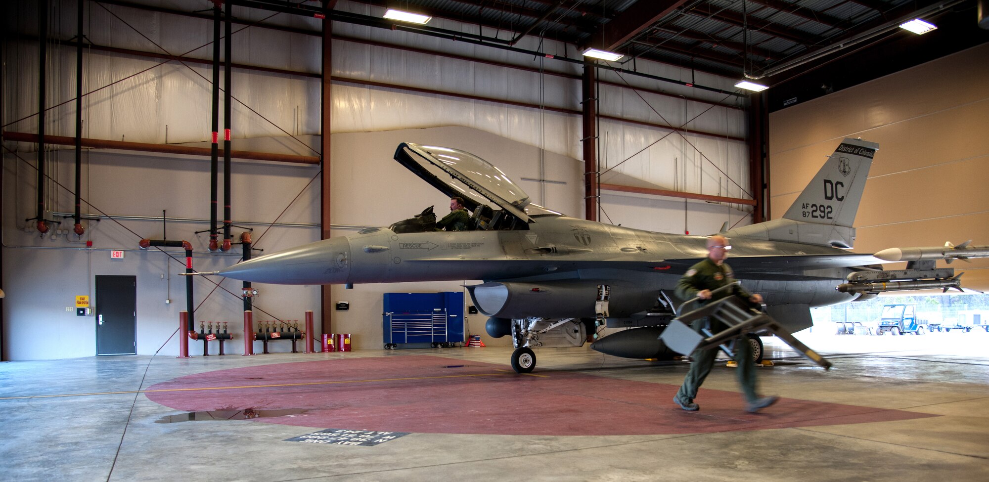 Lt. Col. Eric Haagenson, Washington, D.C., Air National Guard pilot, prepares for his flight during a simulated alert mission at the 113th Fighter Wing’s Aerospace Control Alert Detachment, Joint Base Andrews, Md., March 30, 2015. The 113th ANG reached 5,000 alert missions, March 21, as part of an air defense system for the nation’s capital. The alert unit was created in response to the September 11, terrorist attack on the United States in 2001. (U.S. Air Force photo/Airman 1st Class Philip Bryant)