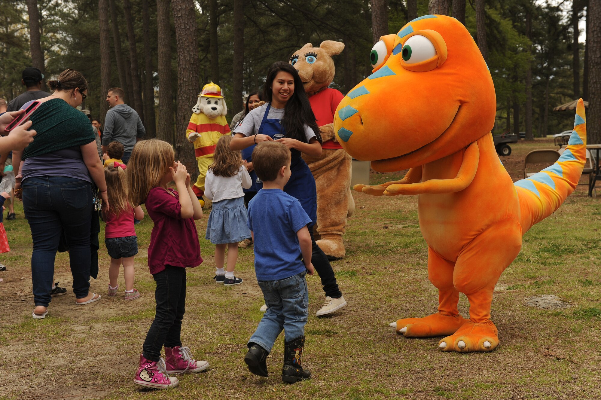 Members of Team Seymour meet mascots from UNC TVs children’s programming during the Month of the Military Child kickoff event April 4, 2014, at Seymour Johnson Air Force Base, North Carolina. Several agencies, including the USO and the 4th Civil Engineer Squadron fire department, helped support the day’s activities. (U.S. Air Force photo/Airman 1st Class Aaron J. Jenne)