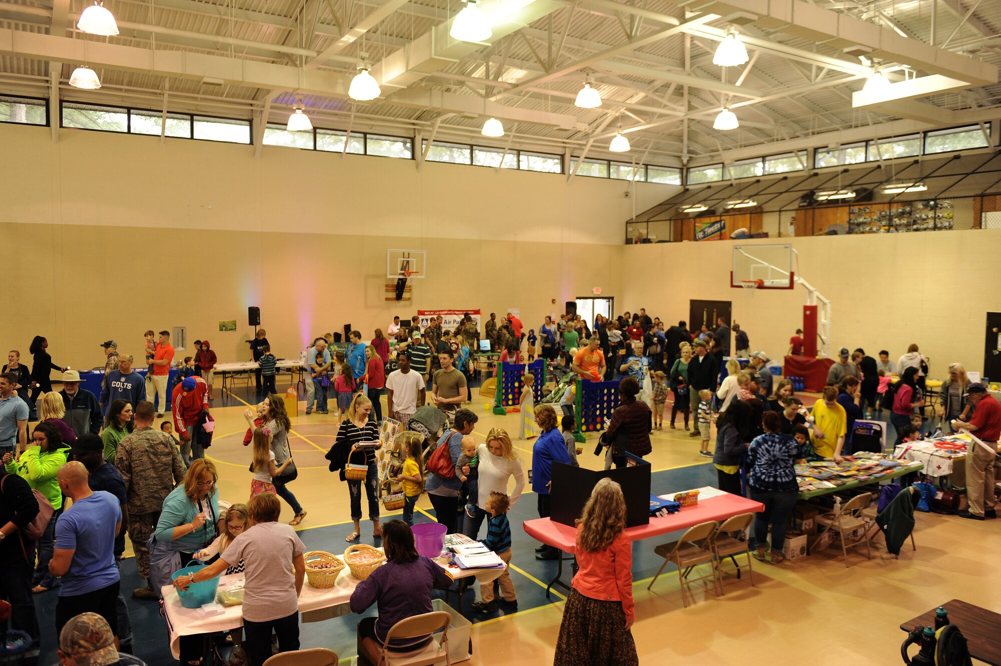 Members of Team Seymour participate in the Month of the Military Child kickoff event April 4, 2015, at Seymour Johnson Air Force Base, North Carolina. The kickoff was hosted by the Youth Center to give families a chance to spend time together and enjoy an array of activities.  (U.S. Air Force photo/Airman 1st Class Aaron J. Jenne)