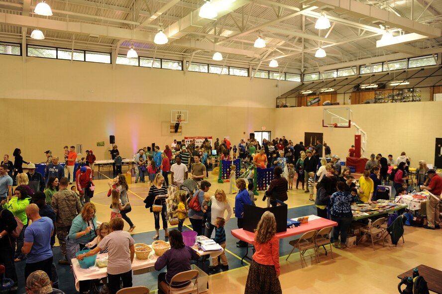 Members of Team Seymour participate in the Month of the Military Child kickoff event April 4, 2015, at Seymour Johnson Air Force Base, North Carolina. The kickoff was hosted by the Youth Center to give families a chance to spend time together and enjoy an array of activities.  (U.S. Air Force photo/Airman 1st Class Aaron J. Jenne)