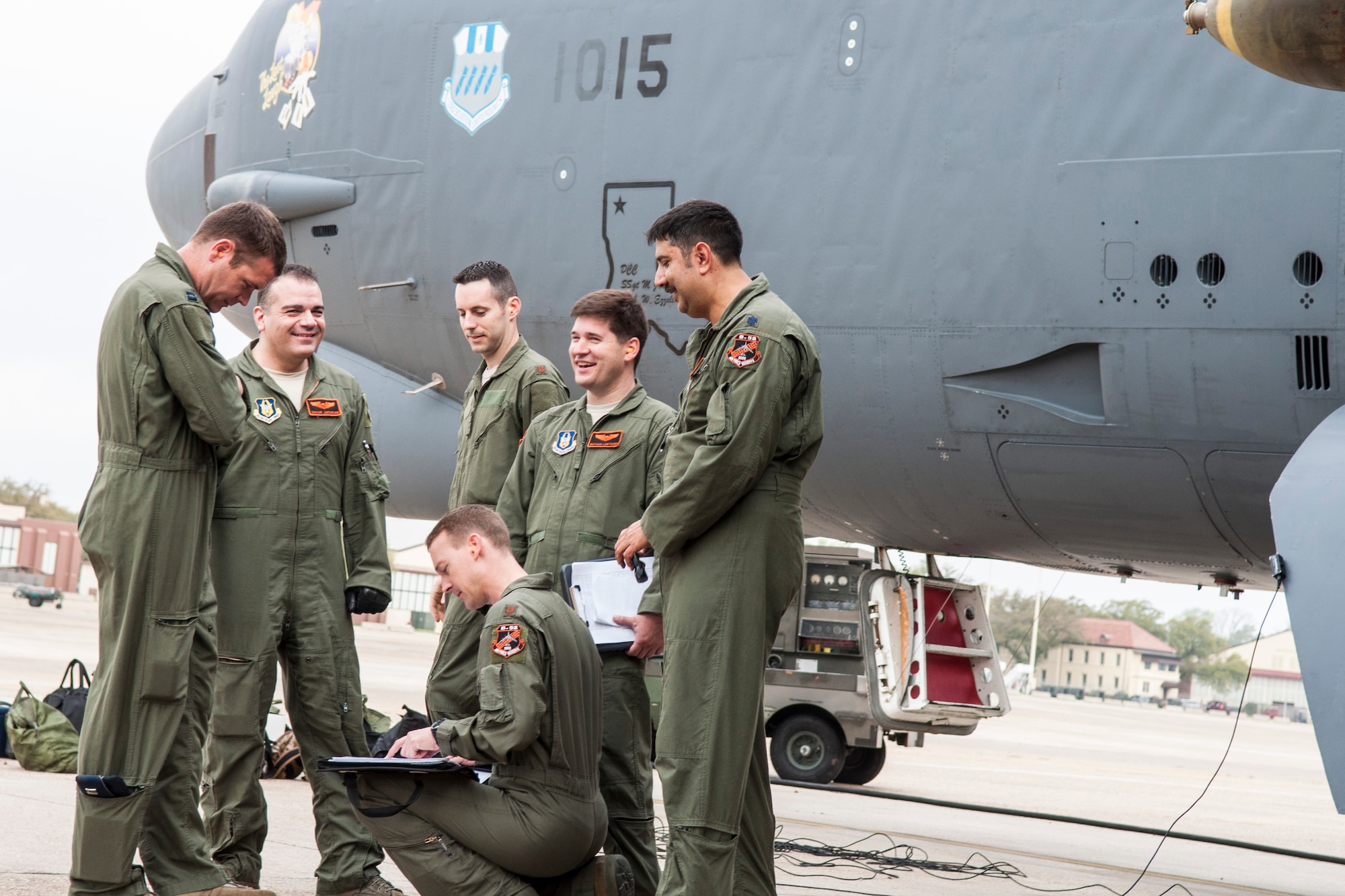 A crew-briefing is given to U.S. Air Force aircrew assigned to the 343rd Bomb Squadron on Barksdale Air Force Base, La. On April 2, 2015 the crew prepared to fly a mission in a B-52 Stratofortress to drop live M117 bombs on a practice range as part of routine training to maintain warfighting capabilities. (U.S. Air Force photo by Master Sgt. Dachelle Melville/Released)