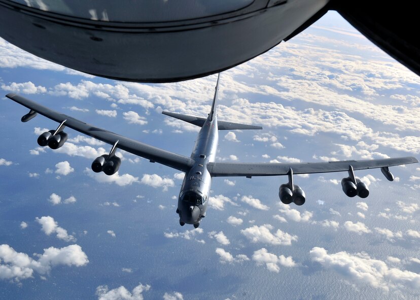 A U.S. Air Force B-52 Stratofortress from Barksdale Air Force Base, La., flies behind a KC-135 Stratotanker from RAF Mildenhall, England, after refueling in support of Polar Growl April 2, 2015, over the United Kingdom. These missions support the nation’s ability to maintain a strong bomber force that enhances the security and stability of the United States’ allies and partners. (U.S. Air Force photo by Airman 1st Class Kyla Gifford/Released)