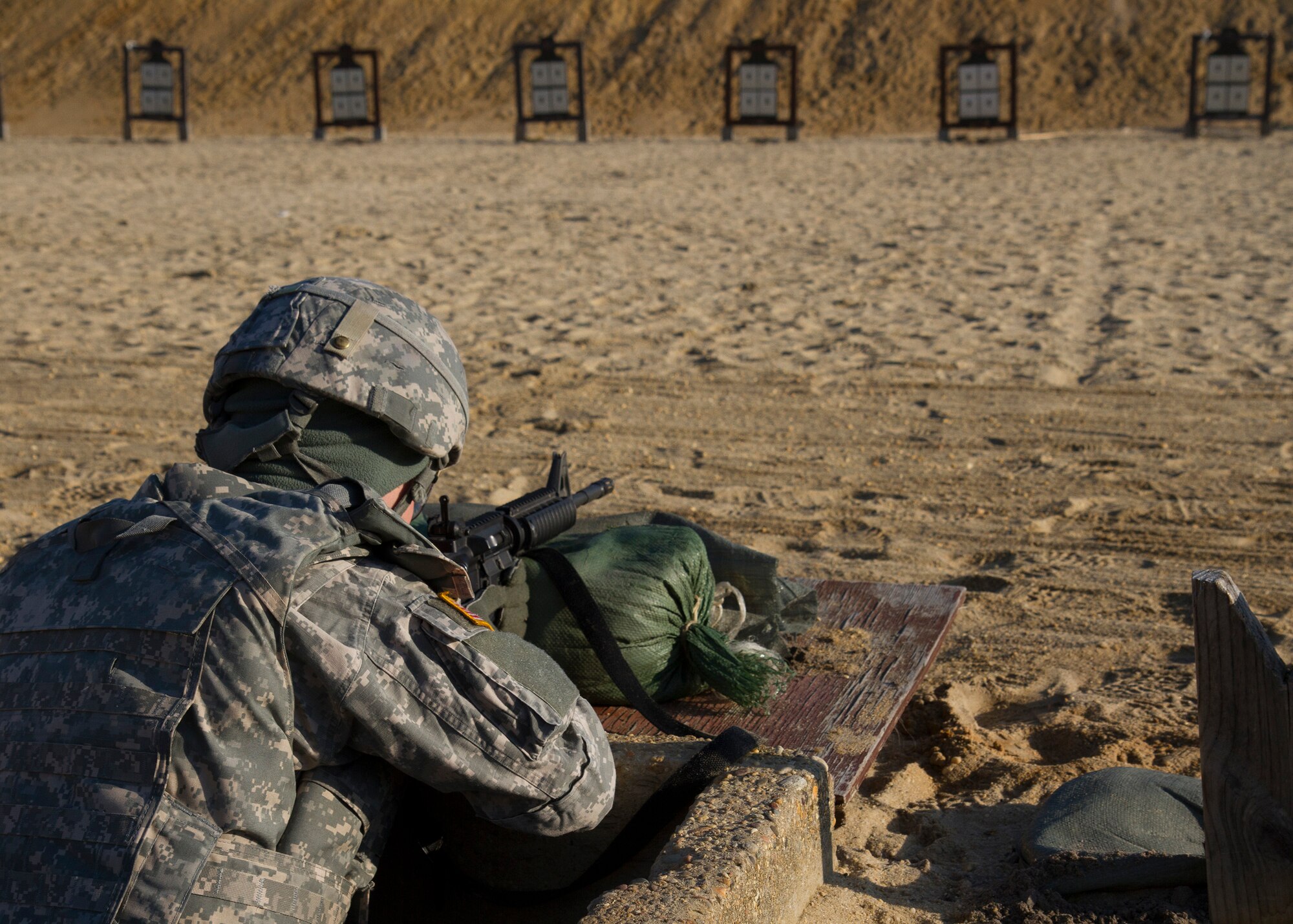An Army Reserve Soldier zeroes his M4 carbine weapons during day three of the 200th Military Police Command???s Best Warrior Competition on April 2 at Joint Base McGuire-Dix-Lakehurst, N.J. Eight warfighters are competing in the weeklong competition held May 31-April 3 in a variety of physical and mental events to earn the top spot of Best Warrior for Soldier and noncommissioned officer of the year. The winners will compete at the Army Reserve Best Warrior Competition held in May. The 200th MPCOM is the largest Department of Defense law enforcement organization with nearly 14,000 Soldiers living in 44 states. (Army Reserve photo by Sgt. 1st Class Mark Bell/released)
