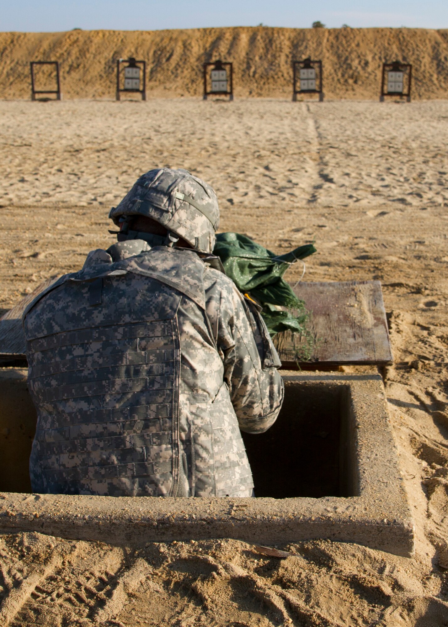 An Army Reserve Soldier zeros his M4 carbine weapons during day three of the 200th Military Police Command???s Best Warrior Competition on April 2 at Joint Base McGuire-Dix-Lakehurst, N.J. Eight warfighters are competing in the weeklong competition held May 31 ??? April 3 in a variety of physical and mental events to earn the top spot of Best Warrior for Soldier and noncommissioned officer of the year. The winners will compete at the Army Reserve Best Warrior Competition held in May. The 200th MPCOM is the largest Department of Defense law enforcement organization, with nearly 14,000 Soldiers living in 44 states. (Army Reserve photo by Sgt. 1st Class Mark Bell/released)