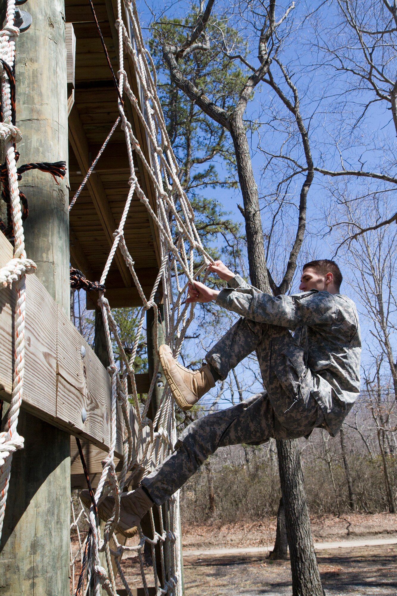 Army Reserve Spc. Jared Blue, 22, from Marion, Ind., completes an obstacle course event during day two of the 200th Military Police Command???s Best Warrior Competition on March 31 at Joint Base McGuire-Dix-Lakehurst, N.J. Eight warfighters are competing in the weeklong competition held March 31 - April 3 in a variety of physical and mental events to earn the top spot of Best Warrior for Soldier and noncommissioned officer of the year. Blue is an intelligence analyst assigned to the Headquarters and Headquarters Company, 384th MP Battalion. The winners will compete at the Army Reserve Best Warrior Competition held in May. The 200th MPCOM is the largest Department of Defense law enforcement organization with nearly 14,000 Soldiers living in 44 states. (Army Reserve photo by Sgt. 1st Class Mark Bell/released)