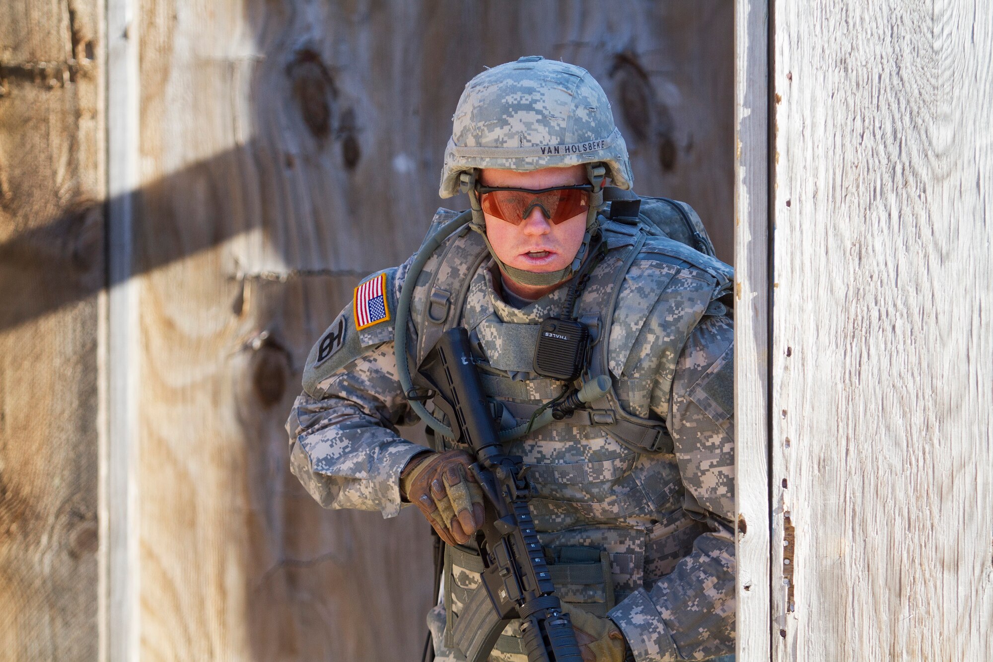 Army Reserve Sgt. Duane Van Holsbeke, 28, from The Colony, Texas, works his way through a scenario-based Army Warrior Task exercise during day two of the 200th Military Police Command???s Best Warrior Competition on April 1 at Joint Base McGuire-Dix-Lakehurst, N.J. Eight warfighters are competing in the weeklong competition held March 31 ??? April 3 in a variety of physical and mental events to earn the top spot of Best Warrior for Soldier and noncommissioned officer of the year. Holsbeke is a Military Police Soldier assigned to the 366th MP Company. The winners will compete at the Army Reserve Best Warrior Competition held in May. The 200th MPCOM is the largest Department of Defense law enforcement organization, with nearly 14,000 Soldiers living in 44 states. (Army Reserve photo by Sgt. 1st Class Mark Bell/released)
