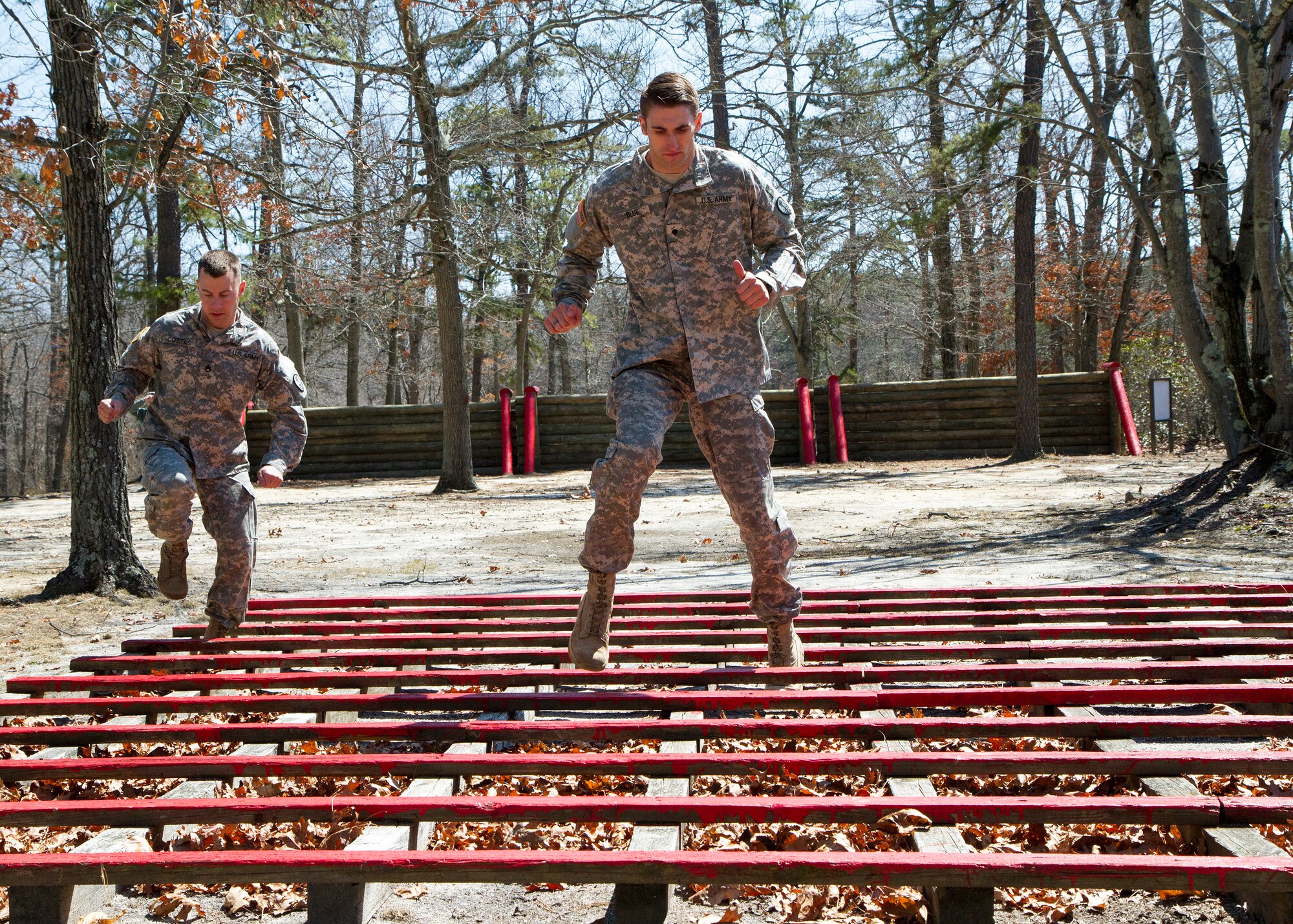Army Reserve Spc. Jared Blue, 22, from Marion, Ind., completes an obstacle course event during day two of the 200th Military Police Command???s Best Warrior Competition on March 31 at Joint Base McGuire-Dix-Lakehurst, N.J. Eight warfighters are competing in the weeklong competition held March 31-April 3 in a variety of physical and mental events to earn the top spot of Best Warrior for Soldier and noncommissioned officer of the year. Blue is an intelligence Analyst assigned to the Headquarters and Headquarters Company, 384th MP Battalion. The winners will compete at the Army Reserve Best Warrior Competition held in May. The 200th MPCOM is the largest Department of Defense law enforcement organization with nearly 14,000 Soldiers living in 44 states. (Army Reserve photo by Sgt. 1st Class Mark Bell/released)