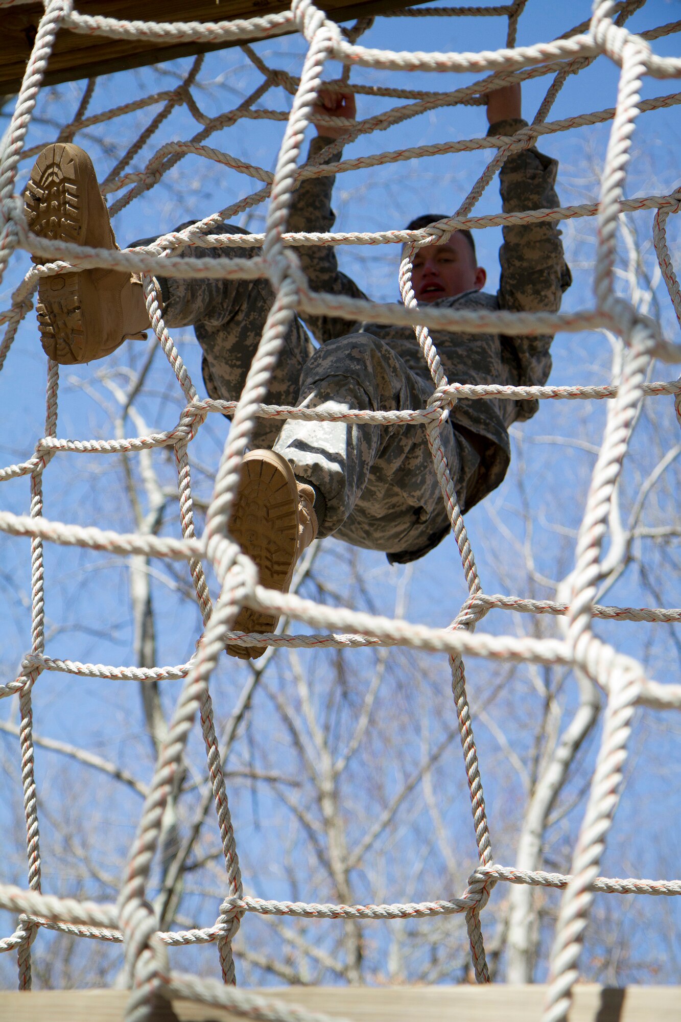 Army Reserve Spc. Michael Goff, 23, a Military Police Soldier, completes an obstacle course event during day two of the 200th Military Police Command???s Best Warrior Competition on April 1 at Joint Base McGuire-Dix???Lakehurst, N.J. Eight warfighters are competing in the weeklong competition held March 31 ??? April 3 in a variety of physical and mental events to earn the top spot of Best Warrior for Soldier and noncommissioned officer of the year. Goff is assigned to the 366th MP Company and from Dallas. The winners will compete at the Army Reserve Best Warrior Competition held in May. The 200th MPCOM is the largest Department of Defense law enforcement organization, with nearly 14,000 Soldiers living in 44 states. (Army Reserve photo by Sgt. 1st Class Mark Bell/released)