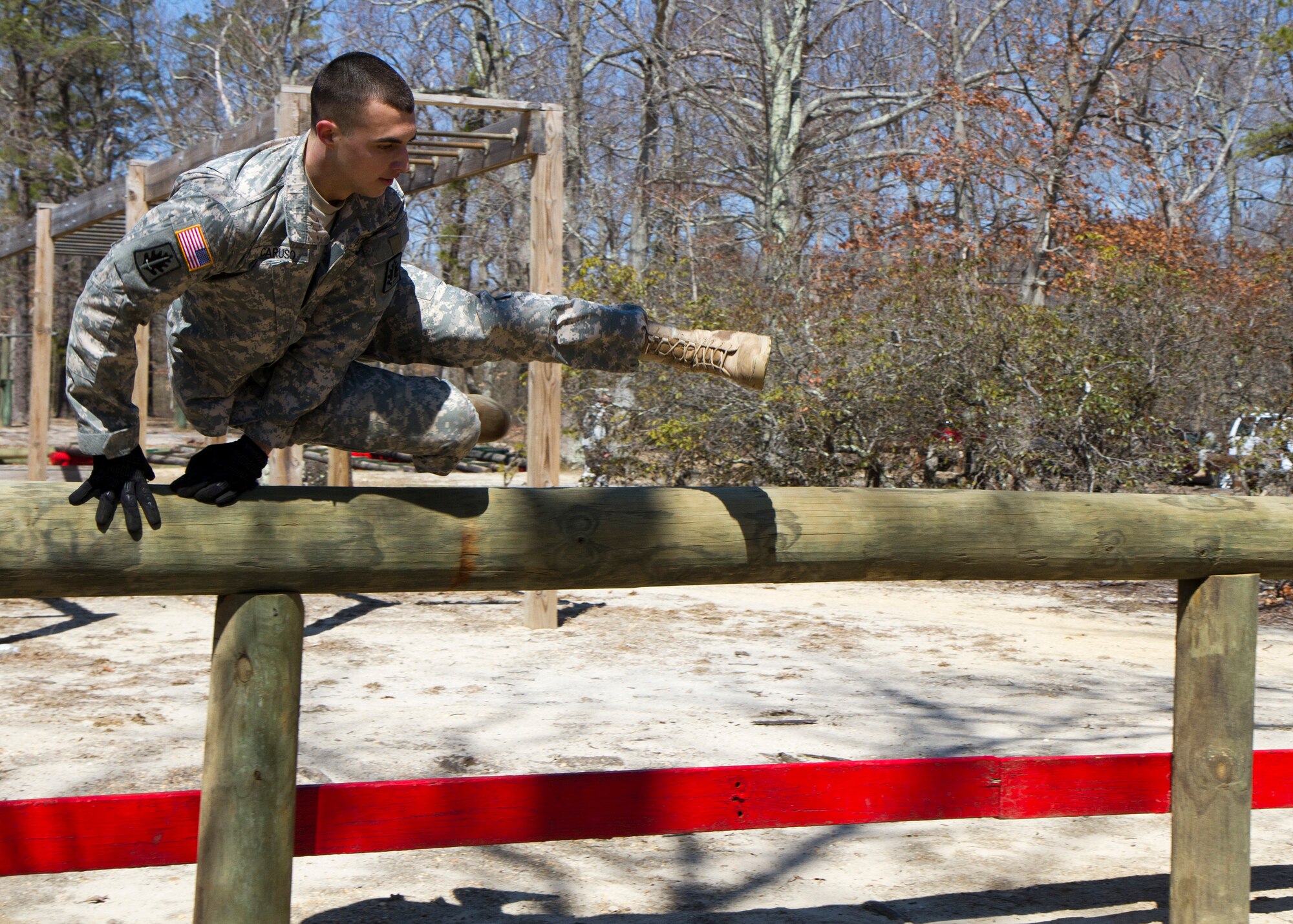 Army Reserve Sgt. Rob Caruso, from Atco, N.J., completes an obstacle course event during day two of the 200th Military Police Command???s Best Warrior Competition on April 1 at Joint Base McGuire-Dix-Lakehurst, N.J. Eight warfighters are competing in the weeklong competition held March 31 ??? April 3 in a variety of physical and mental events to earn the top spot of Best Warrior for Soldier and noncommissioned officer of the year. Caruso is a corrections specialist assigned to 367th Military Police Company. The winners will compete at the Army Reserve Best Warrior Competition held in May. The 200th MPCOM is the largest Department of Defense law enforcement organization, with nearly 14,000 Soldiers living in 44 states. (Army Reserve photo by Sgt. 1st Class Mark Bell/released)