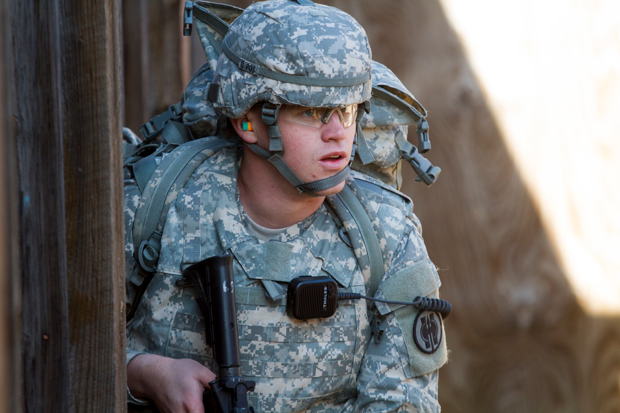 Army Reserve Spc. Michael Goff, 23, a Military Police Soldier, works his way through a scenario-based Army Warrior Task exercise during day two of the 200th Military Police Command???s Best Warrior Competition on April 1 at Joint Base McGuire-Dix-Lakehurst, N.J. Eight warfighters are competing in the weeklong competition held March 31 ??? April 3 in a variety of physical and mental events to earn the top spot of Best Warrior for Soldier and noncommissioned officer of the year. Goff is assigned to the 366th MP Company and from Dallas. The winners will compete at the Army Reserve Best Warrior Competition held in May. The 200th MPCOM is the largest Department of Defense law enforcement organization, with nearly 14,000 Soldiers living in 44 states. (Army Reserve photo by Sgt. 1st Class Mark Bell/released)