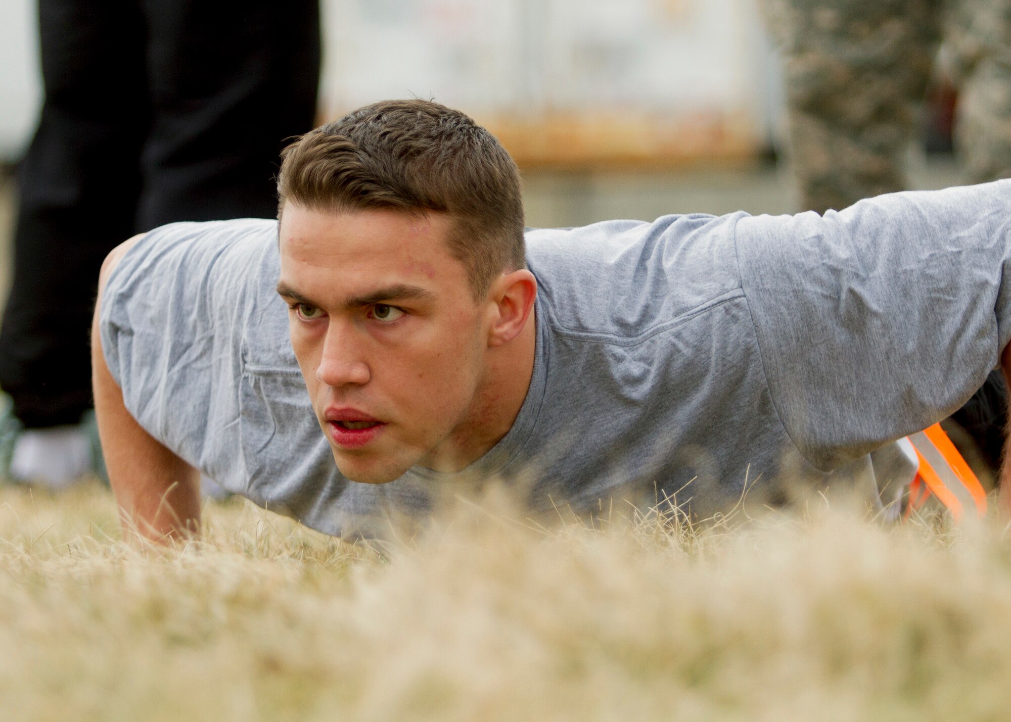 Army Reserve Spc. Kyle Coder, 20, from Murfreesboro, Tenn., completes the pushup event during the Army Physical Fitness Test during day one of the 200th Military Police Command???s Best Warrior Competition on March 31 at Joint Base McGuire-Dix-Lakehurst, N.J. Eight warfighters are competing in the weeklong competition held March 31 ??? April 3 in a variety of physical and mental events to earn the top spot of Best Warrior for Soldier and noncommissioned officer of the year. Coder is a Military Police Soldier assigned to the 450th MP Company. The winners will compete at the Army Reserve Best Warrior Competition held in May. The 200th MPCOM is the largest Department of Defense law enforcement organization, with nearly 14,000 Soldiers living in 44 states. (Army Reserve photo by Sgt. 1st Class Mark Bell/released)