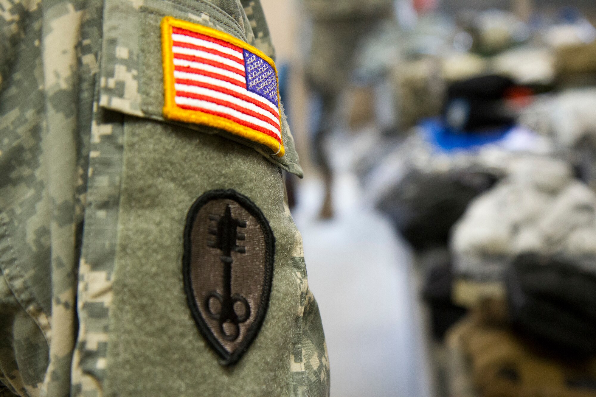 A Soldier assigned to the 300th Military Police Brigade listens to instructions during an inventory of his packing list during day one of the 200th Military Police Command???s Best Warrior Competition on March 31 at Joint Base McGuire-Dix-Lakehurst, N.J. Eight warfighters are competing in the week-long competition held March 31-April 3 in a variety of physical and mental events to earn the top spot of Best Warrior for Soldier and noncommissioned officer of the year. The winners will compete at the Army Reserve Best Warrior Competition held in May. The 200th MPCOM is the largest Department of Defense law enforcement organization with nearly 14,000 Soldiers living in 44 states. (Army Reserve photo by Sgt. 1st Class Mark Bell/released)
