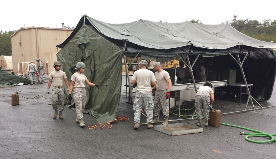 DOBBINS AIR RESERVE BASE, Ga. - 445th Force Support Squadron Airmen set up a single pallet expeditionary kitchen. The SPEK is a highly-mobile deployable kitchen that can feed up to 550 people. (U.S. Air Force photo/Senior Master Sgt. Jim Highland)