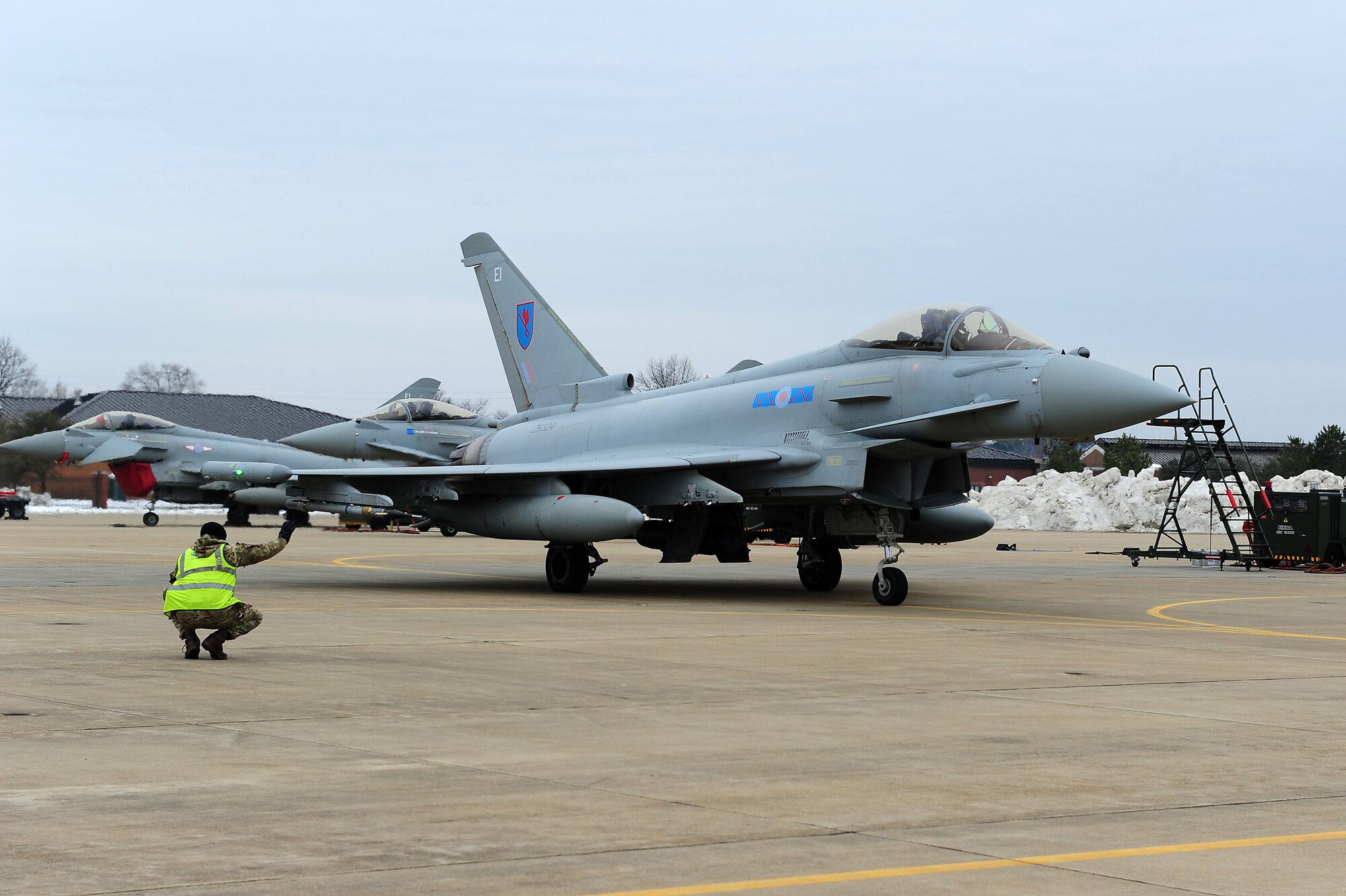 A British Royal Air Force Typhoon FGR4 taxies down the flight line at Langley Air Force Base, Va., March 3, 2015. Approximately 150 British airmen from XI Squadron RAF have joined forces with the 1st and 192nd Fighter Wings to integrate war time readiness efforts of the F-22 Raptor and the Typhoon. (U.S. Air Force photo by Senior Airman Brittany E. N. Murphy/Released)