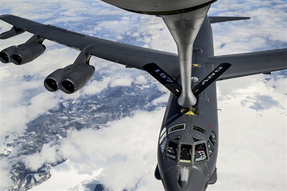 A U.S. Air Force B-52H Stratofortress receives fuel from a New Hampshire Air National Guard KC-135R Stratotanker near the eastern coast of Canada, April 2, 2015. The B-52H was returning home after supporting Polar Growl, a U.S. Strategic Command-directed mission to the Arctic and North Sea regions. The B-52H Stratofortress is assigned to Barksdale Air Force Base, La.