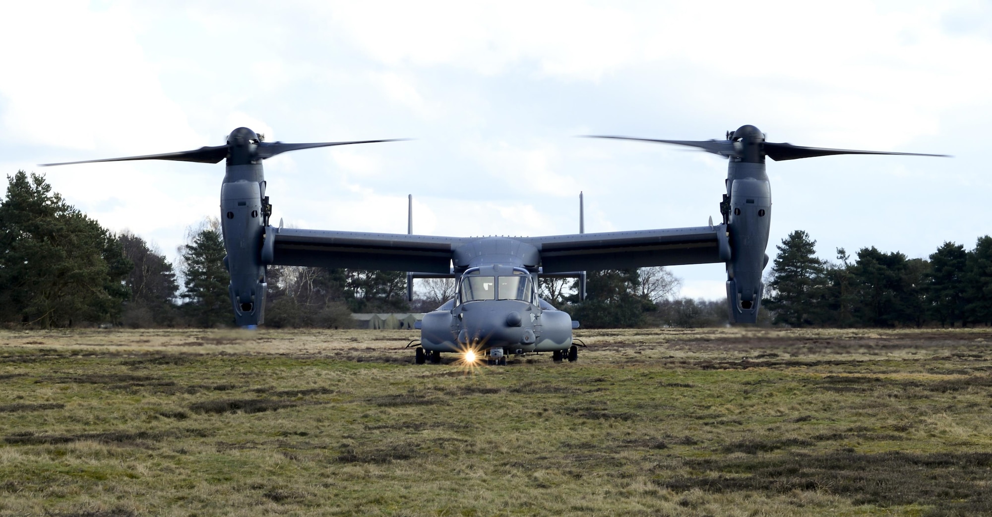A CV-22B Osprey assigned to the 7th Special Operations Squadron prepares to depart while participating in an exercise March 25, 2015, at STANTA Range near Thetford, England. The exercise provided members of the 352nd Special Operations Support Squadron Deployed Aircraft Ground Response Element hands-on training during day and night operations. (U.S. Air Force photo by Senior Airman Victoria H. Taylor)