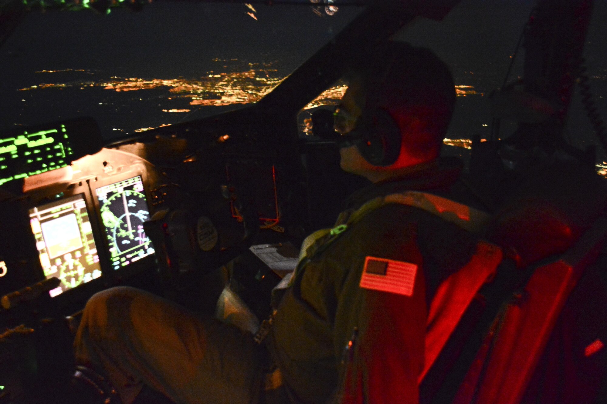 Maj. Matt Etlinger, 312th Airlift Squadron pilot, flies over Northern California April 3 in a C-5M Super Galaxy from Travis Air Force Base, California. Etlinger acted as co-pilot for the record-setting flight. (U.S. Air Force photo by Airman 1st Class Amber Carter)
