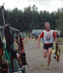 Pfc. Mike Scharn of the South Dakota Guard's 200th Engineer Company leaves the range during the 2010 Summer Biathlon National Championships in Tukwila, Wash., Aug. 19, 2010. He was the winner of the pursuit race in the junior men's division. Running while one hand is on the barrel of the rifle is allowable in summer biathlon.