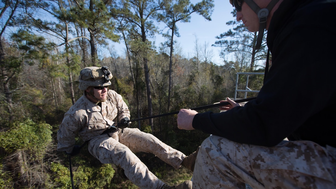 Lance Cpl. Adam Oldham, an infantryman with Golf Company, 2nd Battalion, 2nd Marine Regiment, rappels off the rappel tower aboard Camp Lejeune, North Carolina, April 2, 2015. The rappel tower was one of the unit’s final exercises as part of their individual training package, designed to increase their operability in preparation for their next deployment. 