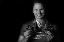 Within the past two years, 2nd Lt. Katherine Shaw, a 633rd Comptroller Squadron budget analyst, competed in one full and one half Ironman race. Shaw is currently training for her second full Ironman race with a goal of beating her previous finish time of 11 hours 40 minutes. Shaw times herself for each portion of the race to reach her goal. (U.S. Air Force photo/Staff Sgt. Natasha Stannard) 