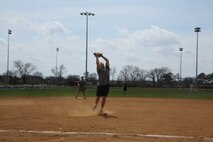 NORFOLK (Apr. 3, 2015) - Major Jeremy Demott, the Exercise Support Officer with U.S. Marine Forces Command, catches a pop-fly during the Navy-Marine Corps Relief Society softball game April 3 at Captain Slade Cutter Park, Norfolk, Virginia. Marines participated in a softball fundraiser for the NMCRS. Each year, fundraising for the NMCRS, happens during March. This year, the deadline was extended until April 10. (U.S. Marine Corps photo by Lance Cpl. Logan Snyder/ RELEASED)