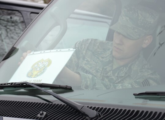 U.S. Air Force Staff Sgt. Jason Prentice, 100th Logistics Readiness Squadron NCO in charge of operators, records and licensing from Portland, Ore., prepares a vehicle for U.S. Air Forces in Europe Inspector General Office inspectors visit, March 19, 2015, on RAF Mildenhall, England. The inspection team visited for a Unit Effectiveness Inspection Capstone Event. (U.S. Air Force photo by Gina Randall/released)
