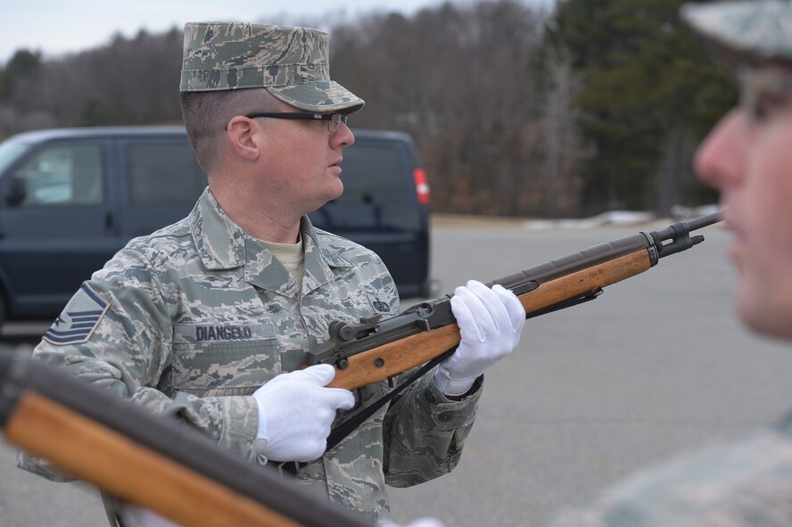 Master Sgt. Christopher DiAngelo, Patriot Honor Guard trainer, reviews the rifle detail firing commands during a funeral honors training exercise, Apr. 2. Throughout March the Patriot Honor Guard team provided 46 military funeral honors. (U.S. Air Force photo by Jerry Saslav)