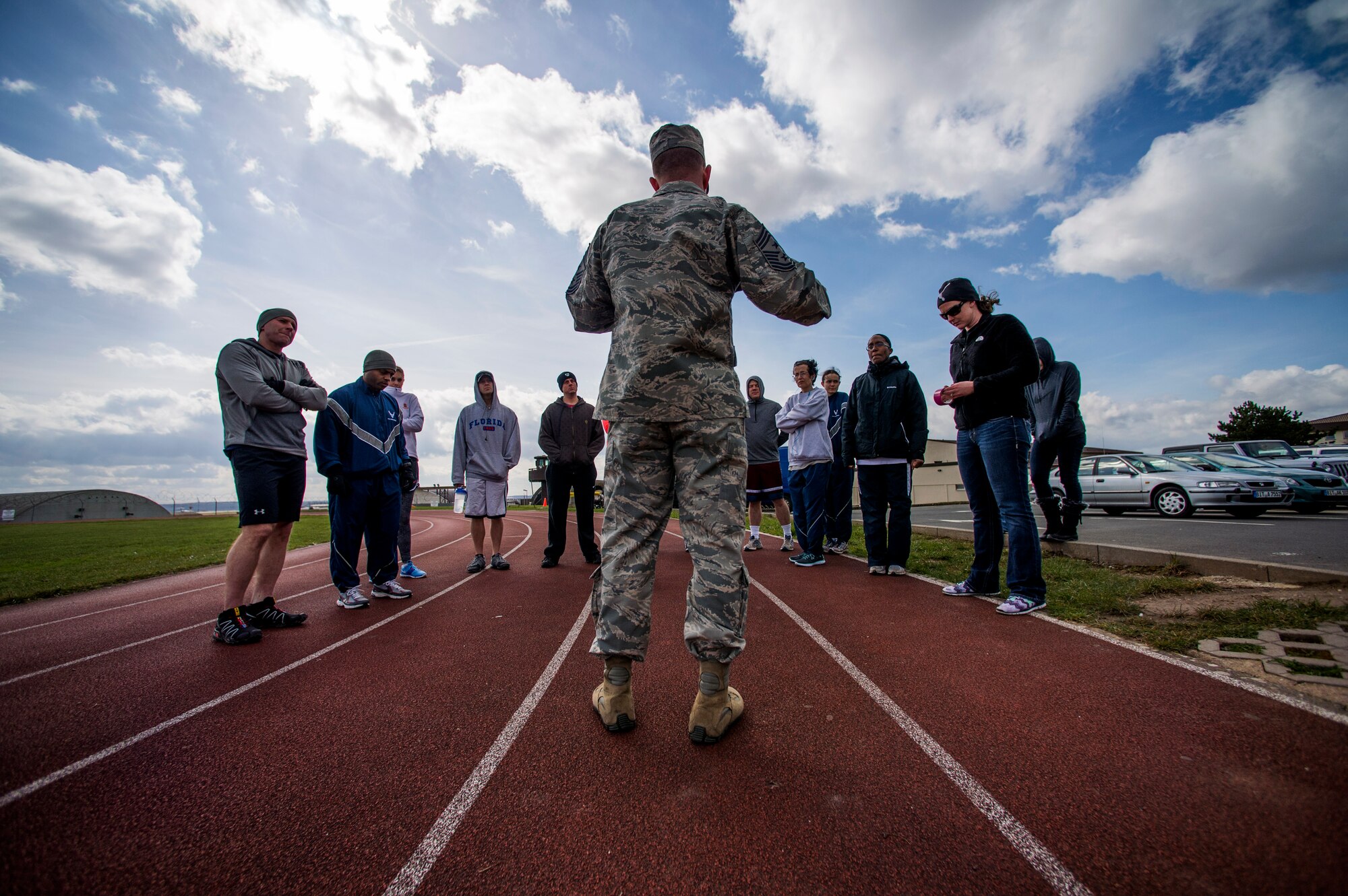 U.S. Air Force Chief Master Sgt. Brian Gates, 52nd Fighter Wing command chief, speaks before the Sexual Assault Awareness and Prevention Month 5K CLEAR Challenge Run at Spangdahlem Air Base, Germany, April 2, 2015. The run served as one of the many events of SAAPM, a month designated for April with the goal of raising sexual assault awareness, and featured the acronym representing Courage, Leadership, Education, Advocacy and Respect. Gates thanked all participants for attending the event and reminded them of the cause for which they were running. (U.S. Air Force photo by Airman 1st Class Timothy Kim/Released)