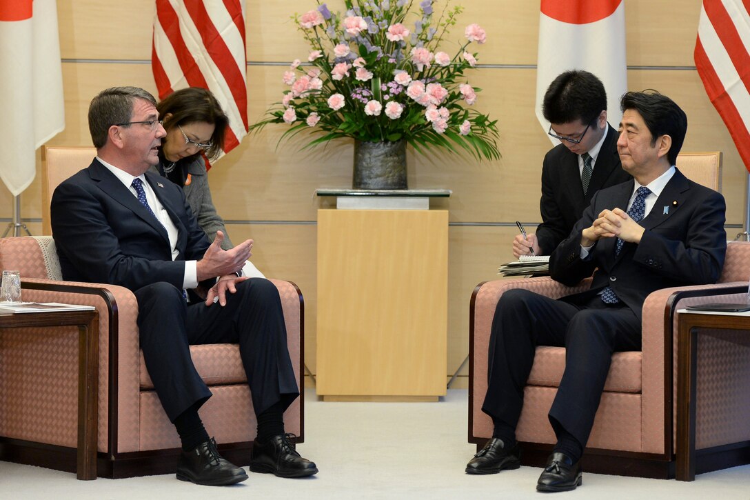 U.S. Defense Secretary Ash Carter, left, meets with Japanese Prime Minister Shinzo Abe in Tokyo, April 8, 2015.