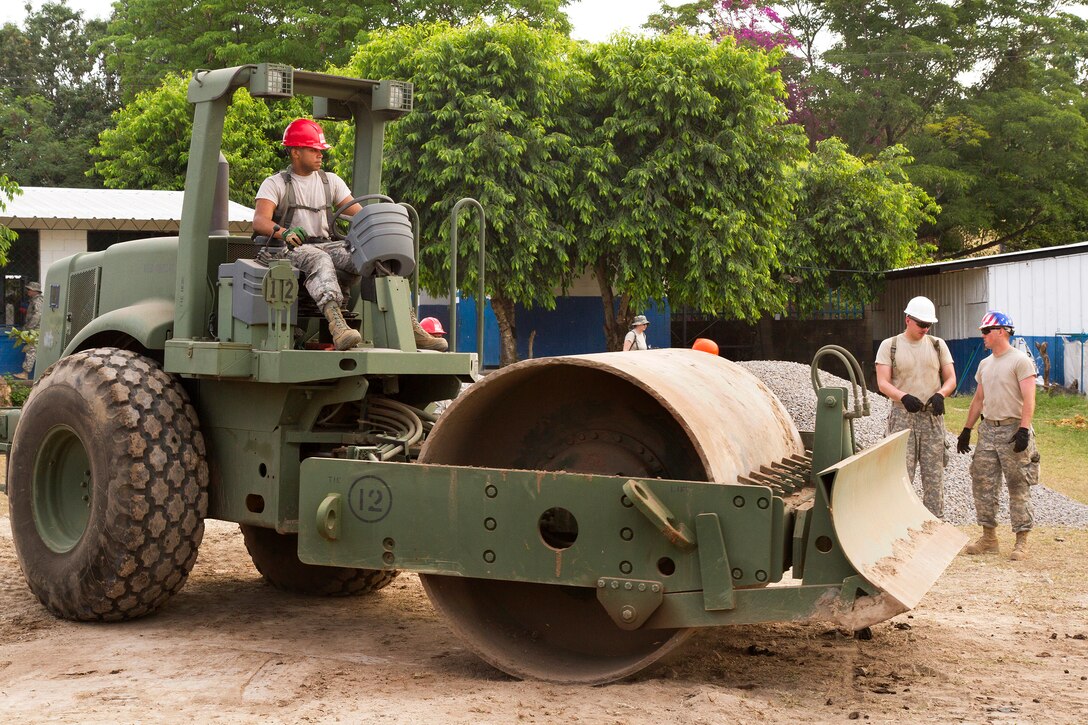 Air Force Senior Airman Griffin Todd III operates a vibratory roller at a school construction site during Beyond the Horizon 2015 in El Salvador, April 2, 2015. Todd is a heavy equipment operator assigned to the 567th Rapid Engineer Deployable Heavy Operational Repair Squadron Engineers, deployed from Seymour Johnson Air Force Base, N.C.