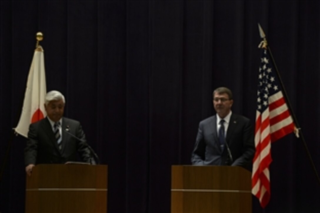 U.S. Defense Secretary Ash Carter participates in a joint news conference with Japanese  Defense Minister Gen  Nakatani at the Defense Ministry in Tokyo,  April 8, 2015. Carter is on a visit to the U.S. Pacific Command Area of Responsibility to make observations for the future force and the rebalance to the Pacific.

