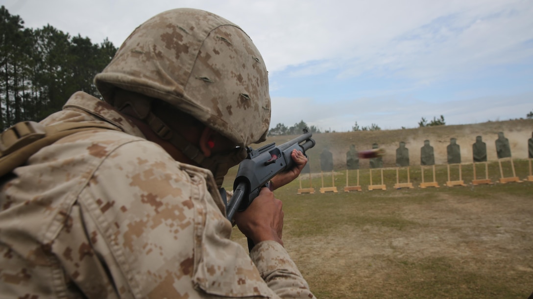 A Marine with 2nd Intelligence Battalion fires an M1014 Joint Service Combat Shotgun during a live-fire range aboard Marine Corps Base Camp Lejeune, N.C., April 2, 2015. Marines conducted the range to familiarize themselves with the weapon system as well as bolster their confidence in employing it. 