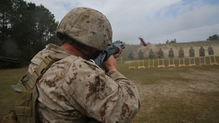 A Marine with 2nd Intelligence Battalion fires an M1014 Joint Service Combat Shotgun during a live-fire range aboard Marine Corps Base Camp Lejeune, N.C., April 2, 2015. Marines conducted the range to familiarize themselves with the weapon system as well as bolster their confidence in employing it. 