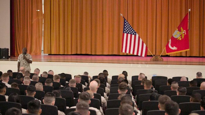 Sergeant Major of the Marine Corps Sgt. Maj. Ronald L. Green speaks to Marines March 26 during a visit to Okinawa. The commandant, Gen. Joseph F. Dunford, and the sergeant major traveled to the Marine bases on Okinawa from March 24-26 to talk with Marines about their expectations for the Marines and the Corps. “My priorities are to make sure we have the warfighting capabilities we need, to address the maturity of our leaders and to make sure they have the training, education and the experience that they need to be successful on the battlefield,” said Dunford. (U.S. Marine Corps Photo by Cpl. Thor J. Larson/Released)