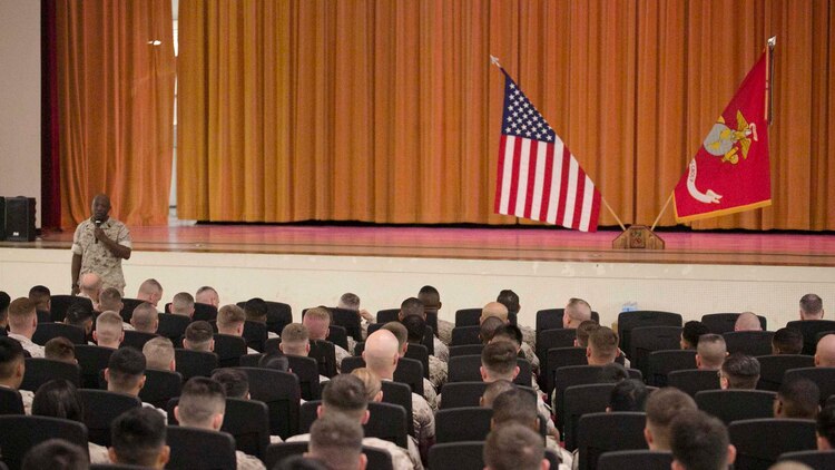 Sergeant Major of the Marine Corps Sgt. Maj. Ronald L. Green speaks to Marines March 26 during a visit to Okinawa. The commandant, Gen. Joseph F. Dunford, and the sergeant major traveled to the Marine bases on Okinawa from March 24-26 to talk with Marines about their expectations for the Marines and the Corps. “My priorities are to make sure we have the warfighting capabilities we need, to address the maturity of our leaders and to make sure they have the training, education and the experience that they need to be successful on the battlefield,” said Dunford. (U.S. Marine Corps Photo by Cpl. Thor J. Larson/Released)