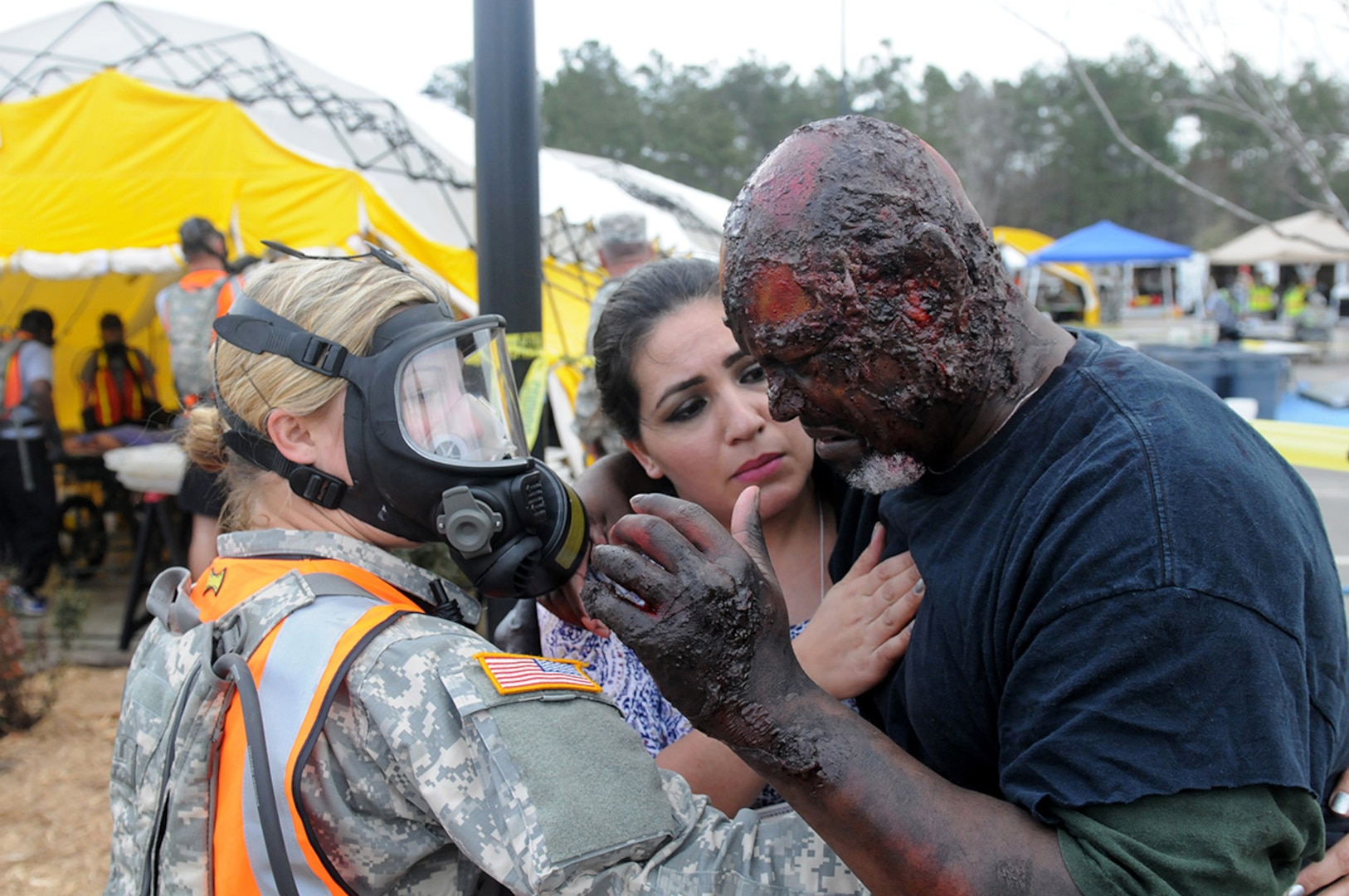 U.S. Army Pfc. Sarah Wells of the Georgia National Guard’s 179th Military Police Company tries to calm down a victim of a simulated building collapse during Vigilant Guard in Georgetown, S.C., on March 10, 2015.Vigilant Guard is a series of federally funded disaster-response drills conducted by National Guard units working with federal, state and local emergency management agencies and first responders.