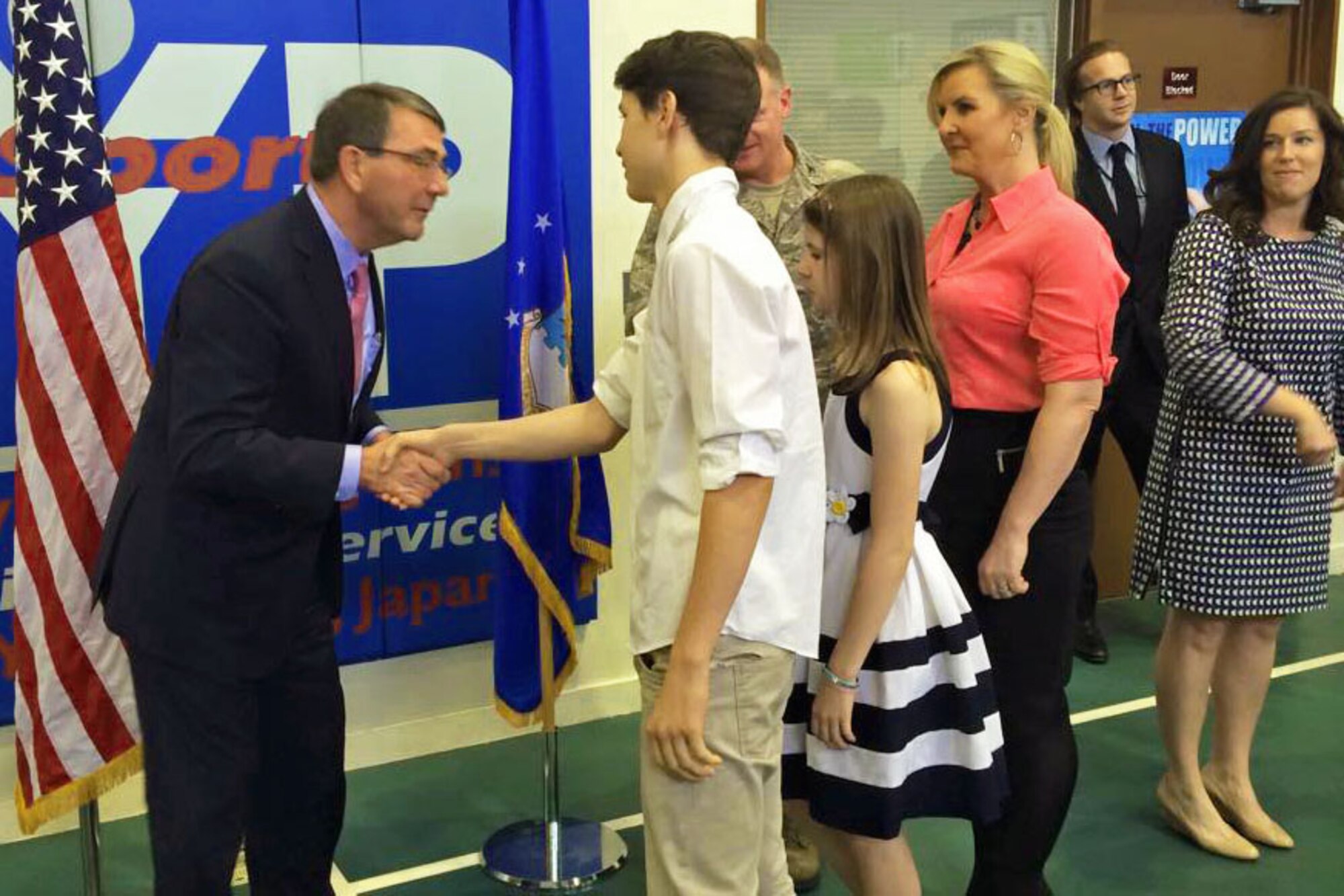 Defense Secretary Ash Carter meets military children on Yokota Air Base, Japan, March 8, 2015, where he hosted a town hall with service members and their families. Carter is on his first trip as secretary to strengthen and modernize U.S. alliances in the Asia-Pacific region. (Department of Defense photo) 