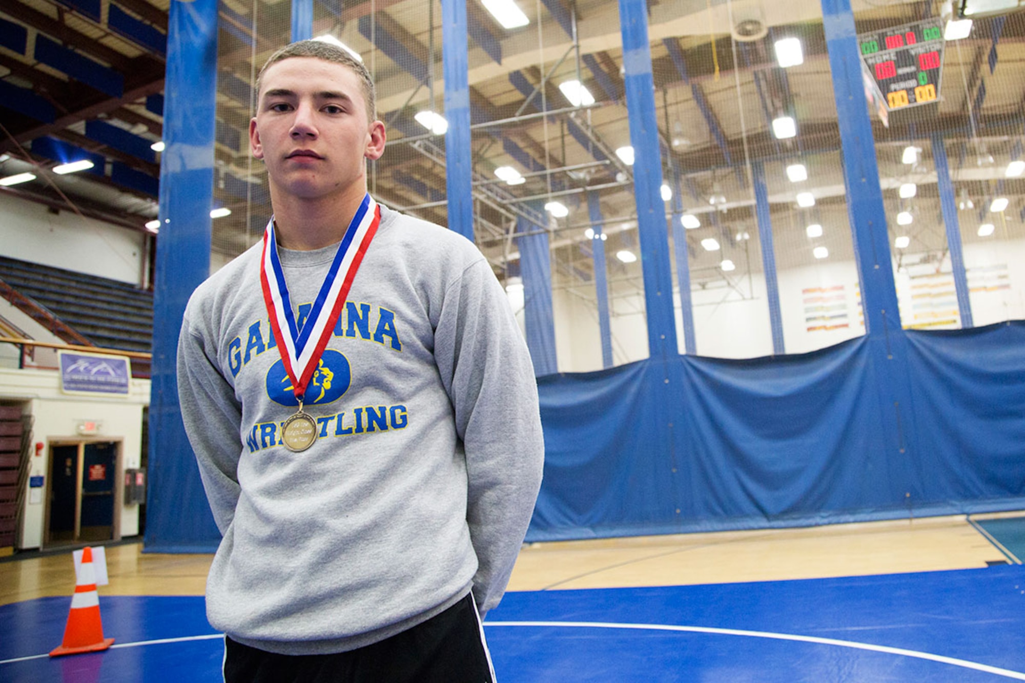 Service members compete in an intramural wrestling tournament on Joint Base Elmendorf-Richardson, Alaska, April 9, 2015. (U.S.Air Force photo/Alejandro Pena)